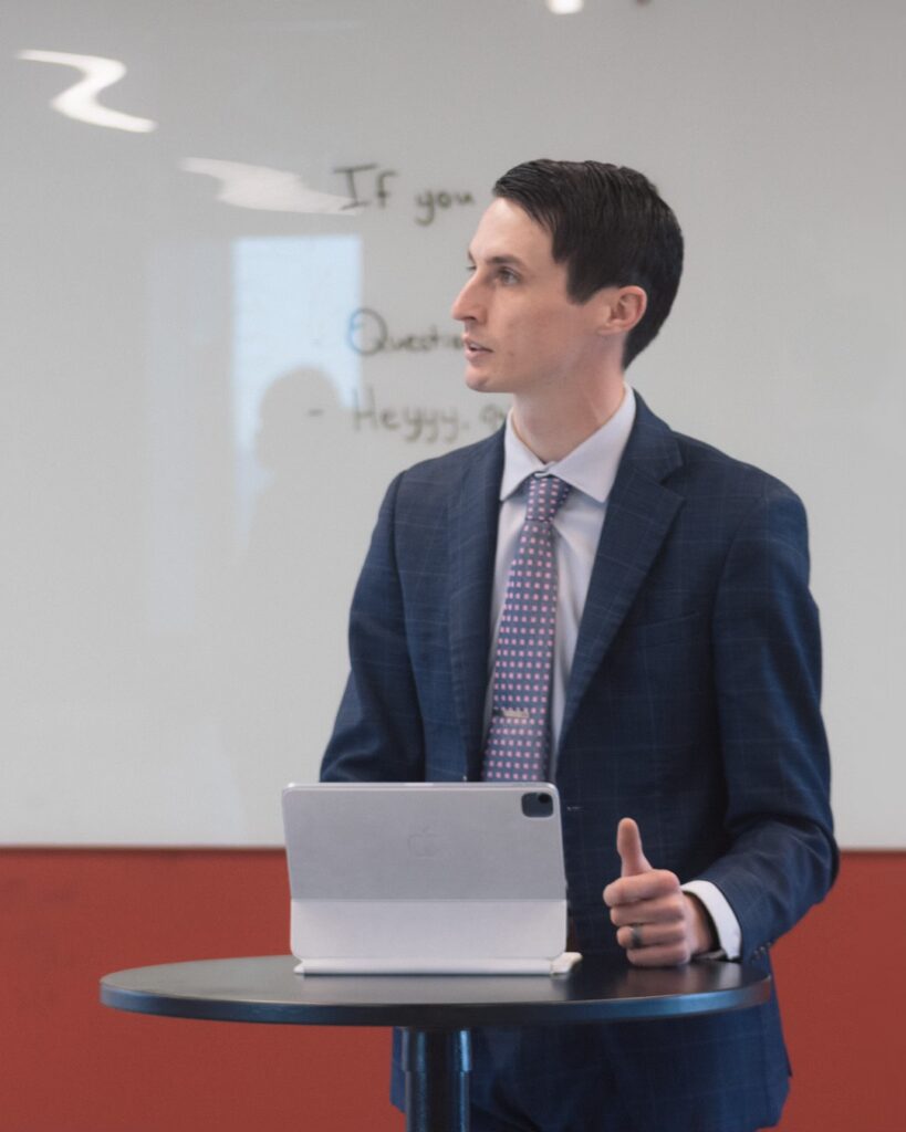 A sales mentor presenting for interns